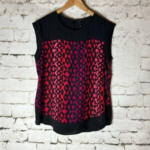 Woman’s cap sleeve black geometric print top L